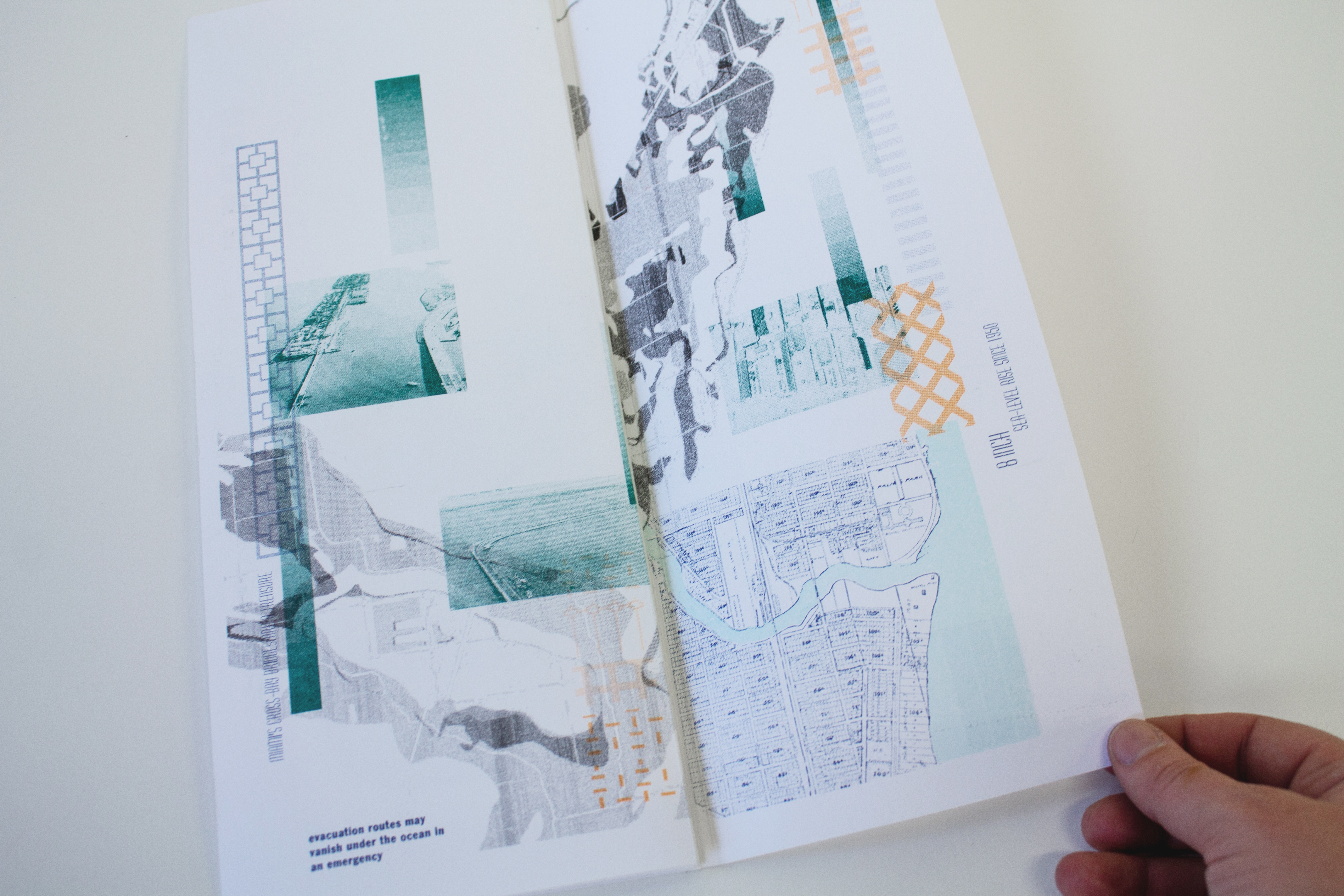 Back spread of the artist book with layered flooding maps
